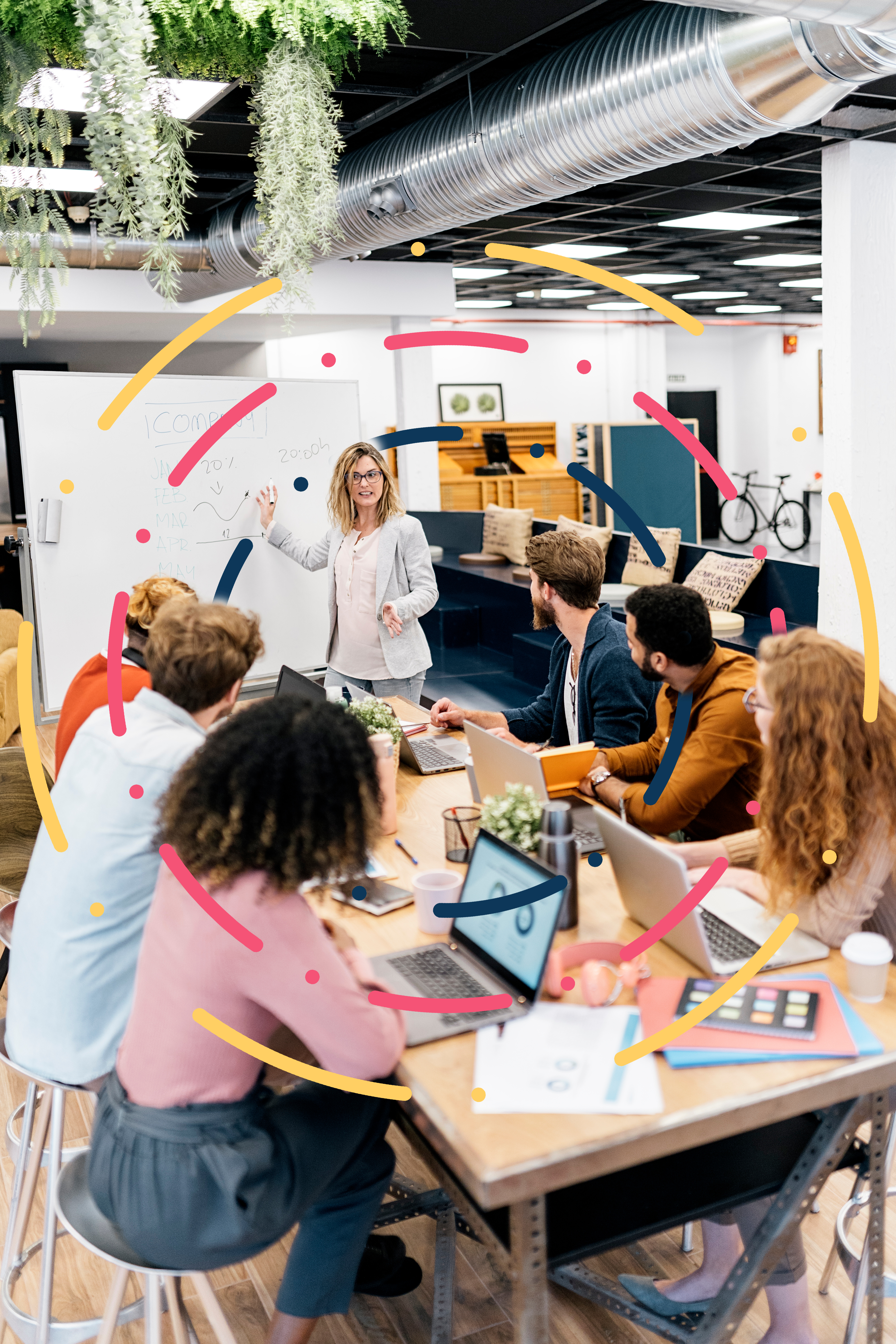 Woman in group at whiteboard